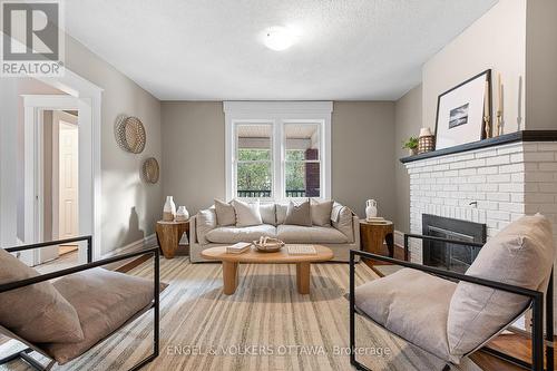 293-295 Holmwood Avenue, Ottawa, ON - Indoor Photo Showing Living Room With Fireplace