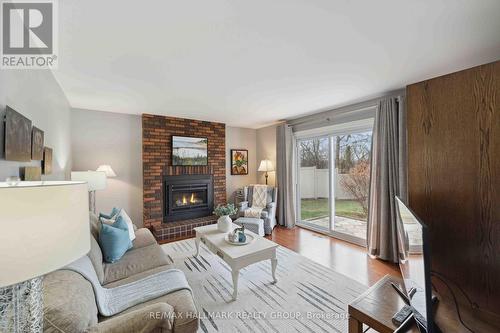 6084 Voyageur Drive, Ottawa, ON - Indoor Photo Showing Living Room With Fireplace