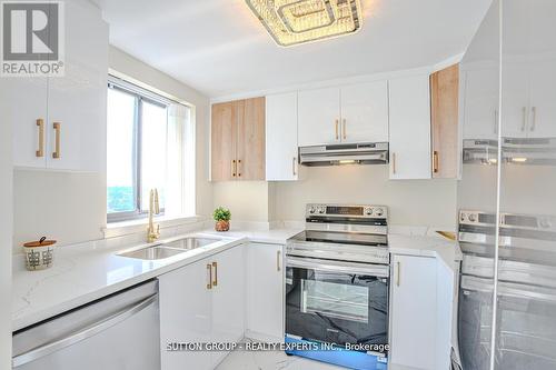 907 - 4235 Sherwoodtowne Boulevard, Mississauga, ON - Indoor Photo Showing Kitchen With Double Sink