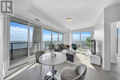 4910 - 30 Shore Breeze Drive, Toronto, ON - Indoor Photo Showing Living Room