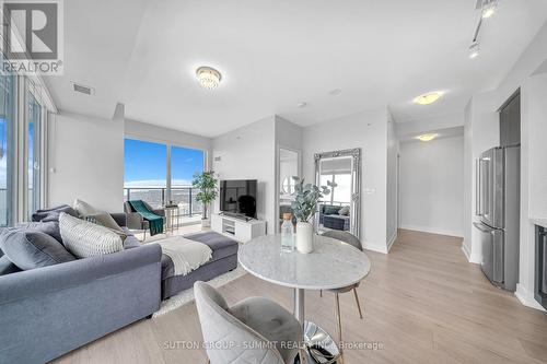 4910 - 30 Shore Breeze Drive, Toronto, ON - Indoor Photo Showing Living Room