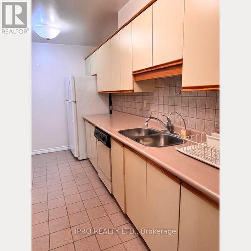 606 - 65 Southport Street E, Toronto, ON - Indoor Photo Showing Kitchen With Double Sink