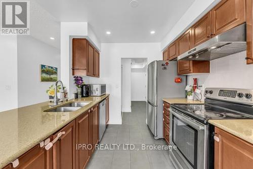 325 - 10 Mendelssohn Street, Toronto, ON - Indoor Photo Showing Kitchen With Double Sink