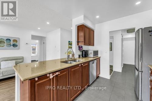 325 - 10 Mendelssohn Street, Toronto, ON - Indoor Photo Showing Kitchen With Double Sink