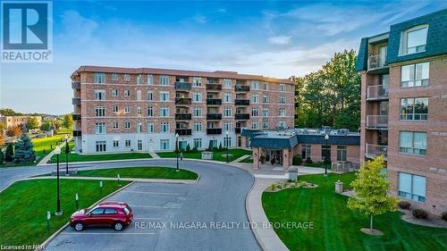 523 - 8111 Forest Glen Drive, Niagara Falls (208 - Mt. Carmel), ON - Outdoor With Balcony With Facade