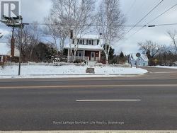 View of front of home featuring covered porch - 