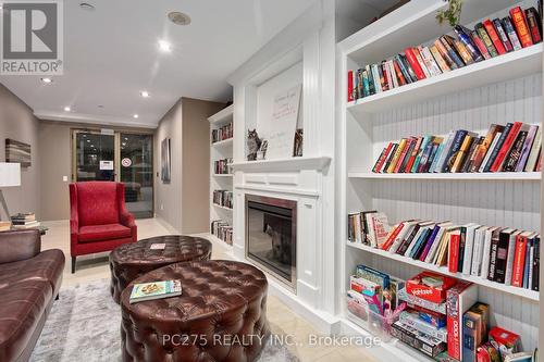 2404 - 330 Ridout Street N, London, ON - Indoor Photo Showing Other Room With Fireplace