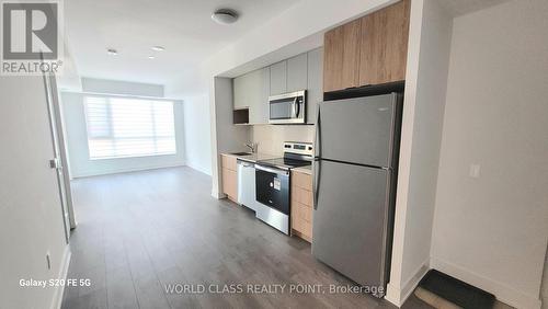 1404 - 202 Burnhamthorpe Road E, Mississauga, ON - Indoor Photo Showing Kitchen With Stainless Steel Kitchen