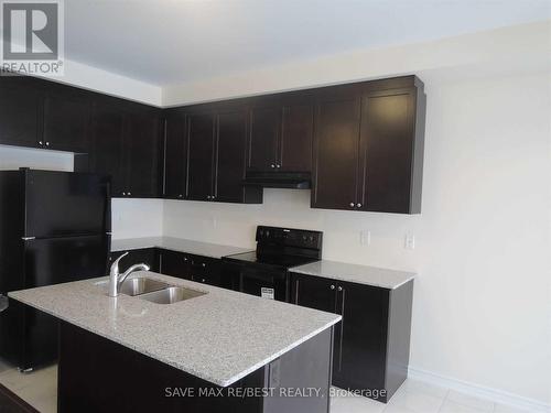 12 Circus Crescent, Brampton, ON - Indoor Photo Showing Kitchen With Double Sink