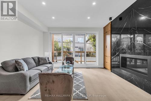 828 Alpine Avenue, Ottawa, ON - Indoor Photo Showing Living Room With Fireplace