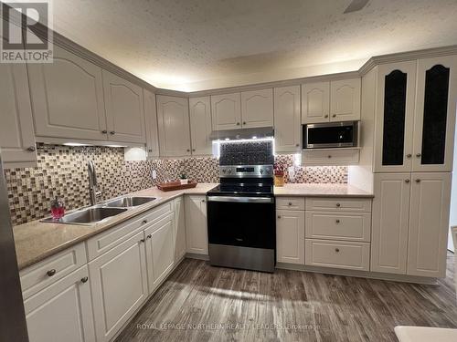 1125 Brundy Avenue, Timmins (Sch - Gold Centre), ON - Indoor Photo Showing Kitchen With Double Sink