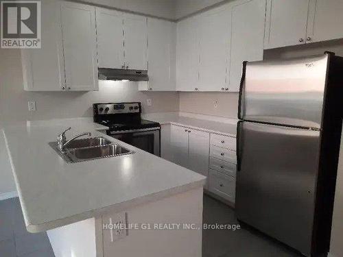 49 Loftsmoor Drive, Brampton, ON - Indoor Photo Showing Kitchen With Double Sink