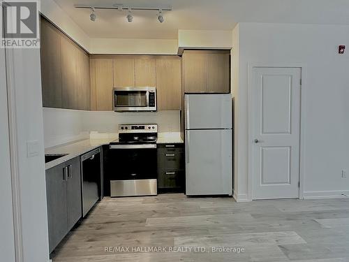 Ph15 - 1010 Dundas Street E, Whitby, ON - Indoor Photo Showing Kitchen With Stainless Steel Kitchen