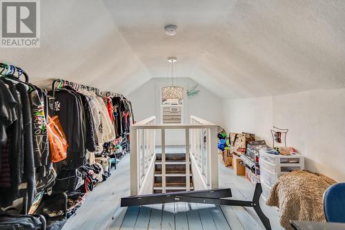 Front house loft bedroom - 980 Coronation Avenue, Kelowna, BC - Indoor With Storage