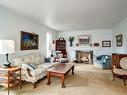 Salon - 446 Montrose Drive, Beaconsfield, QC  - Indoor Photo Showing Living Room With Fireplace 