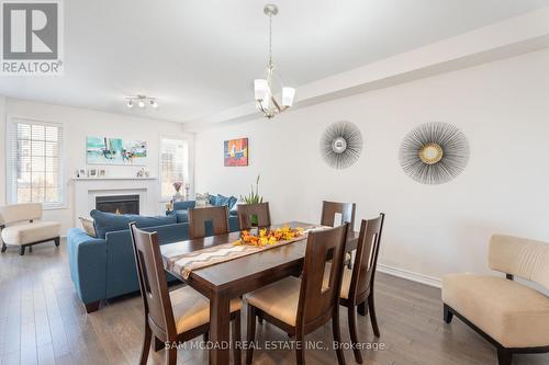 3094 Blackfriar Common, Oakville, ON - Indoor Photo Showing Dining Room With Fireplace