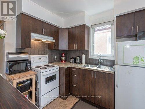 119 Belgravia Avenue, Toronto, ON - Indoor Photo Showing Kitchen With Double Sink