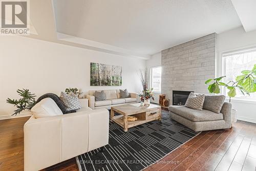 2244 Dewsbury Drive, Oakville, ON - Indoor Photo Showing Living Room With Fireplace