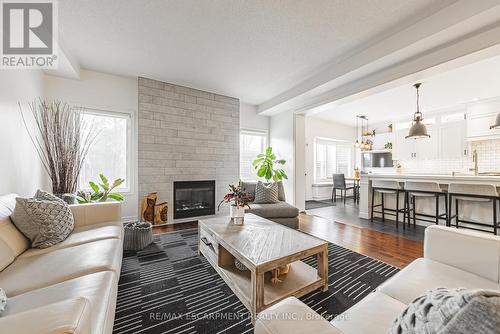 2244 Dewsbury Drive, Oakville, ON - Indoor Photo Showing Living Room With Fireplace