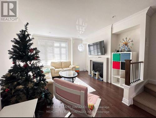 2097 Queensborough Gate, Mississauga, ON - Indoor Photo Showing Living Room With Fireplace