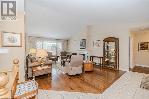 Living room featuring vaulted ceiling - 64 Cottonwood Crescent, Cambridge, ON - Indoor Photo Showing Living Room