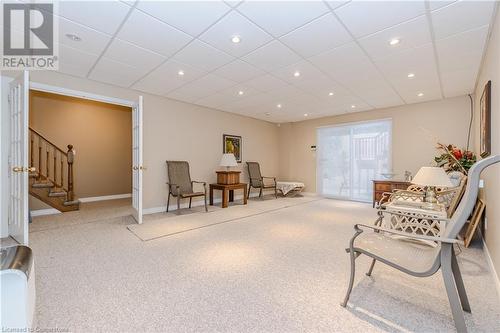 Family room featuring carpet flooring and 9ft ceilings - 64 Cottonwood Crescent, Cambridge, ON - Indoor Photo Showing Other Room