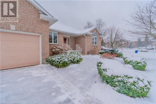 View of front of house with a garage - 64 Cottonwood Crescent, Cambridge, ON - Outdoor