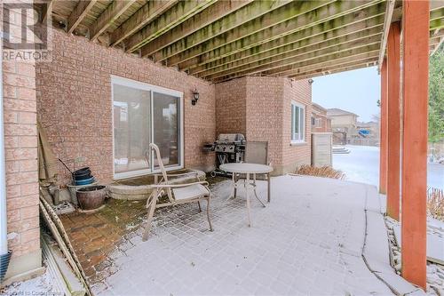 Snow covered patio featuring area for grilling - 64 Cottonwood Crescent, Cambridge, ON - Outdoor With Exterior