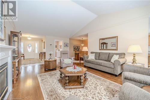 Living room with vaulted ceiling - 64 Cottonwood Crescent, Cambridge, ON - Indoor Photo Showing Living Room With Fireplace