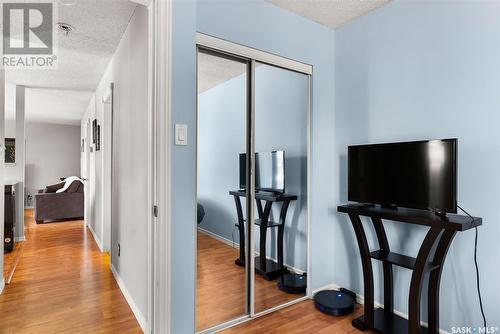 202 2315 Mcintyre Street, Regina, SK - Indoor Photo Showing Other Room With Fireplace