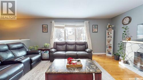 6006 1St Avenue N, Regina, SK - Indoor Photo Showing Living Room With Fireplace