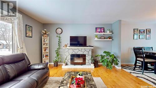 6006 1St Avenue N, Regina, SK - Indoor Photo Showing Living Room With Fireplace