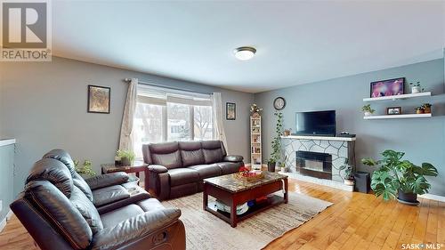 6006 1St Avenue N, Regina, SK - Indoor Photo Showing Living Room With Fireplace