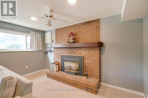 47 Westfield Drive, St. Catharines, ON - Indoor Photo Showing Living Room With Fireplace