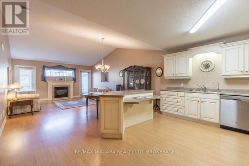 35 - 605 Welland Avenue, St. Catharines (444 - Carlton/Bunting), ON - Indoor Photo Showing Kitchen With Fireplace With Double Sink