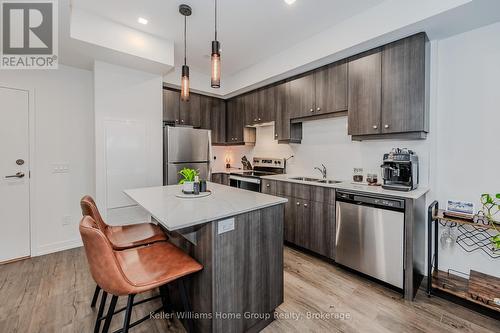 418 - 251 Northfield Drive E, Waterloo, ON - Indoor Photo Showing Kitchen With Stainless Steel Kitchen With Double Sink With Upgraded Kitchen