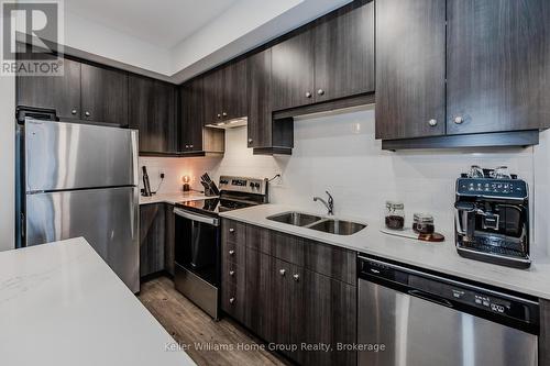 418 - 251 Northfield Drive E, Waterloo, ON - Indoor Photo Showing Kitchen With Stainless Steel Kitchen With Double Sink With Upgraded Kitchen