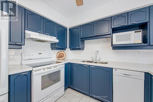 518 - 115 Bonis Avenue, Toronto, ON - Indoor Photo Showing Kitchen With Double Sink