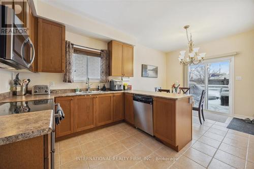 1306 Macinally Court, Oshawa, ON - Indoor Photo Showing Kitchen With Double Sink