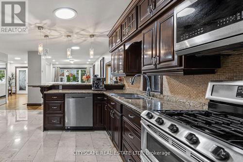 11 Brookside Drive, Mississauga, ON - Indoor Photo Showing Kitchen With Stainless Steel Kitchen With Double Sink With Upgraded Kitchen