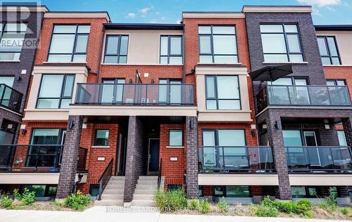 116 - 100 Dufay Road, Brampton, ON - Outdoor With Balcony With Facade