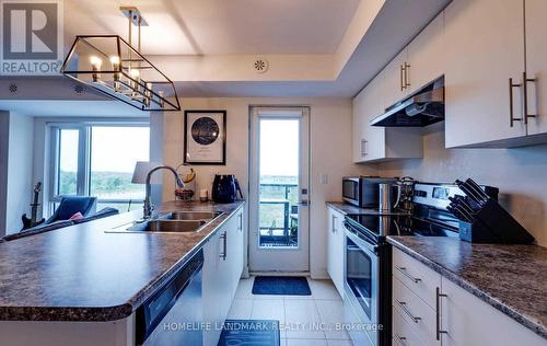 116 - 100 Dufay Road, Brampton, ON - Indoor Photo Showing Kitchen With Double Sink