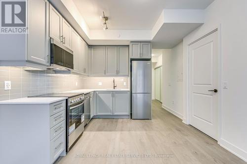 215 - 2333 Khalsa Gate, Oakville, ON - Indoor Photo Showing Kitchen With Stainless Steel Kitchen With Upgraded Kitchen