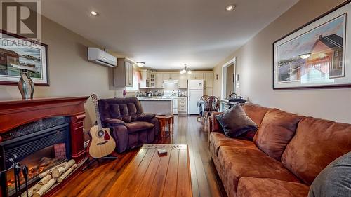 41 Solomon Close, Bay Bulls, NL - Indoor Photo Showing Living Room With Fireplace