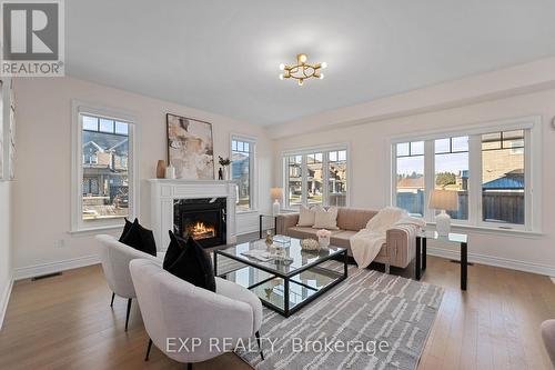 102 Mac Campbell Way, Bradford West Gwillimbury, ON - Indoor Photo Showing Living Room With Fireplace