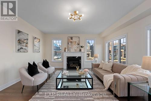 102 Mac Campbell Way, Bradford West Gwillimbury, ON - Indoor Photo Showing Living Room With Fireplace