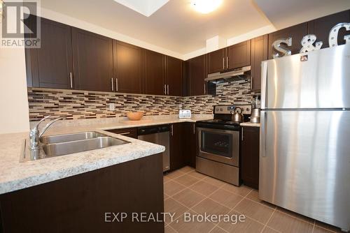 03-03 - 2420 Baronwood Drive, Oakville, ON - Indoor Photo Showing Kitchen With Double Sink With Upgraded Kitchen