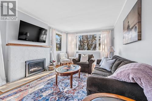 4 Strathcona Crescent, Kingston (West Of Sir John A. Blvd), ON - Indoor Photo Showing Living Room With Fireplace