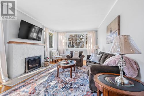 4 Strathcona Crescent, Kingston (West Of Sir John A. Blvd), ON - Indoor Photo Showing Living Room With Fireplace