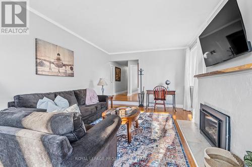 4 Strathcona Crescent, Kingston (West Of Sir John A. Blvd), ON - Indoor Photo Showing Living Room With Fireplace